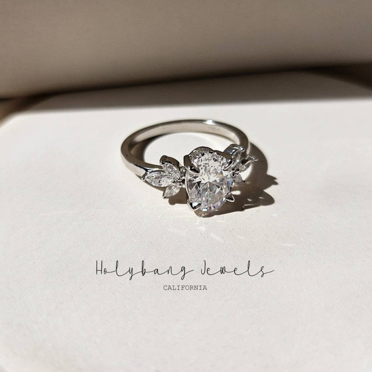 FLORAL OVAL CUT CRYSTAL RING in SILVER