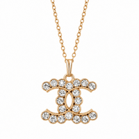 Gold and Crystal CC Necklace